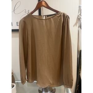 Sheer tan blouse with gold buttons and shoulder detail